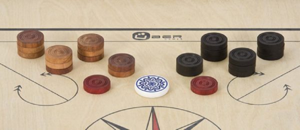 Set of Carrom pieces (including striker)